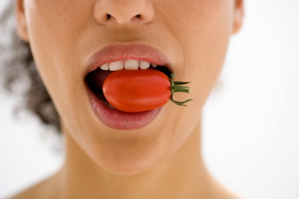 cherry tomato in mouth_74d0a8084c922c02ee9f24b7d370d02f