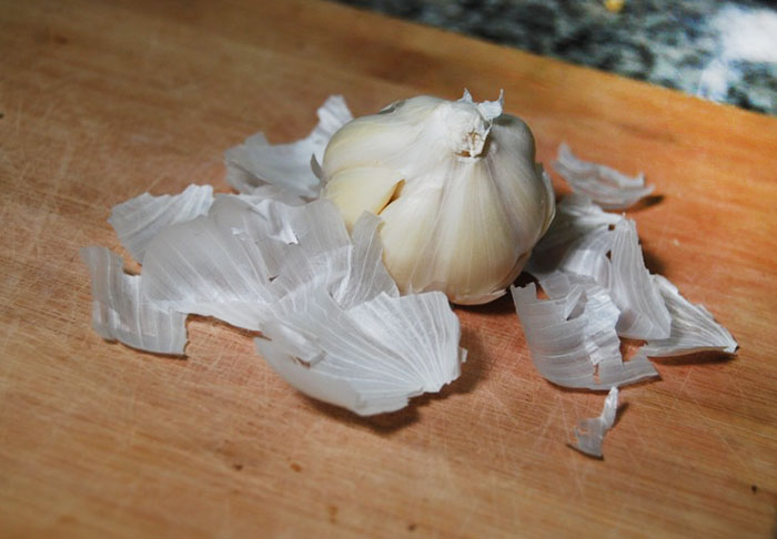 Step 1 - Peel garlic