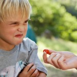 Boy and tomato